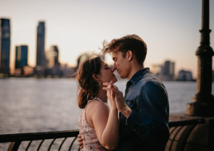 couple photographer taking photos at battery park, nyc
