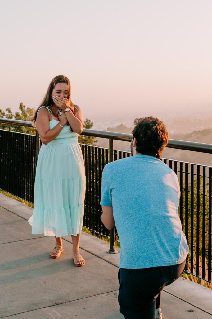 surprise proposal photographer at griffith observatory in LA