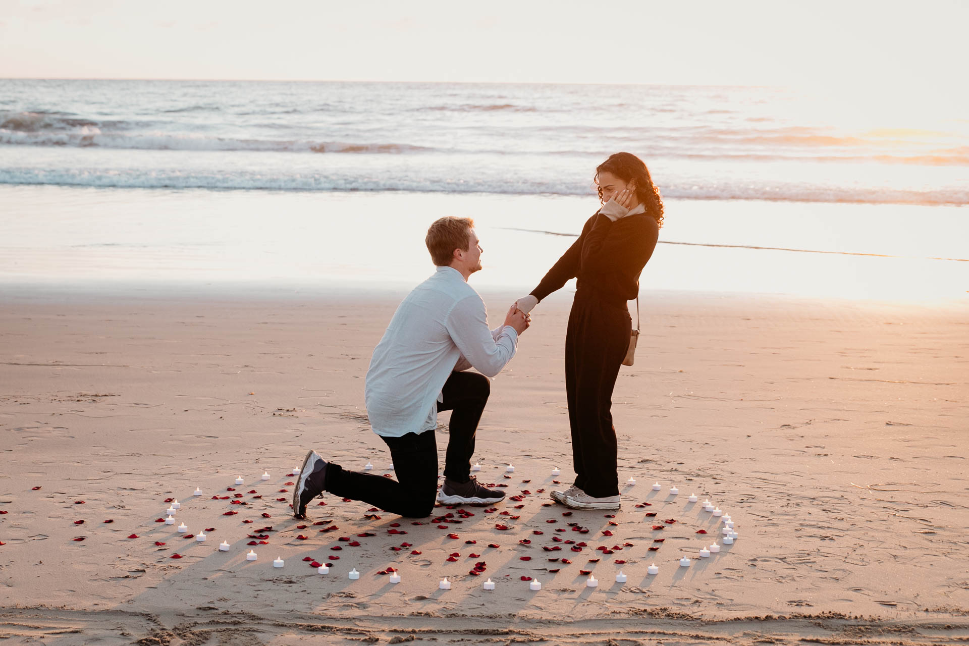 surprise proposal at santa monica beach at sunset