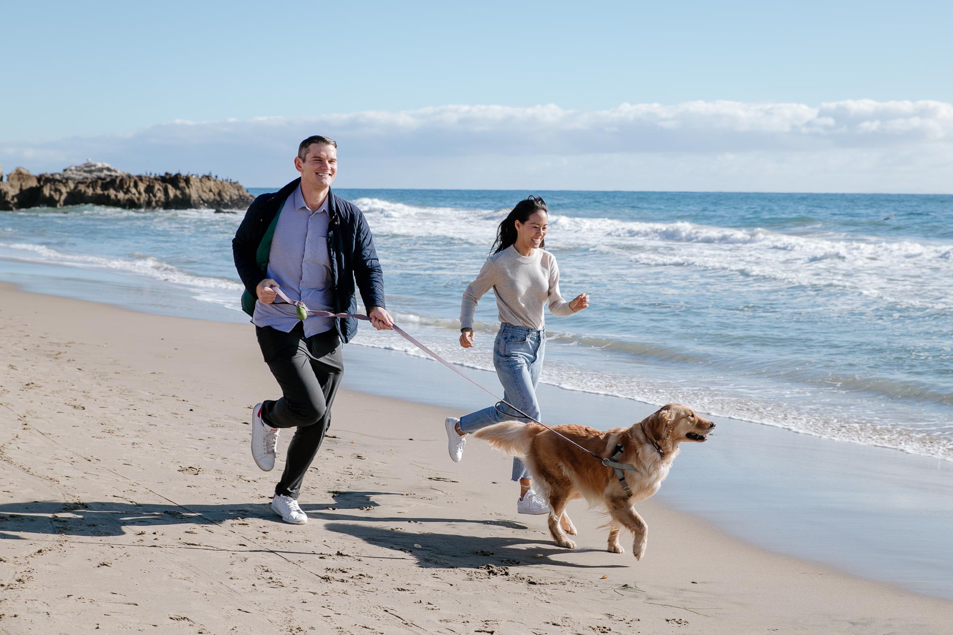 los angeles couple and engagement photoshoot at the beach with a dog
