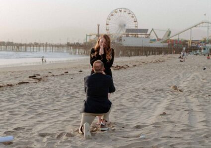 lovely surprise proposal at sunset in santa monica beach